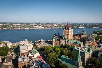 Aerial view of historical landmark Frontenac castle and St Lawrence River during summer in Quebec City, Canada.	