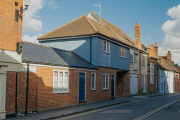 Traditional british brick house with blue door at Saffron Walden, England