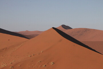 Fototapeta na wymiar red sand desert dunes