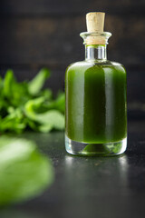 oil green herbs and spices, garlic, parsley, dill, basil fresh mint meal snack on the table copy space food background  