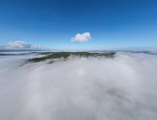 Valley fog is a fascinating meteorological phenomenon that forms due to the condensation of water vapor in the air near the earth's surface