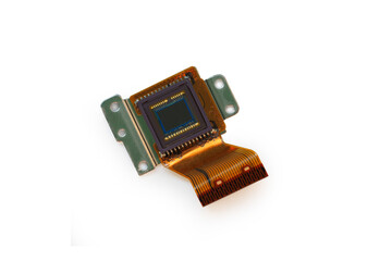 CCD sensor of a digital camera isolated on white background. Silicon CCD matrix