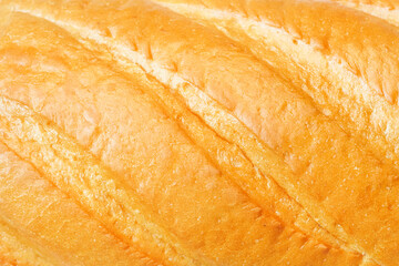 Loaf of bread background, top view. Bread texture