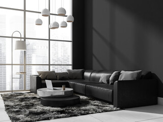 Dark living room interior with sofa and coffee table near window, mockup