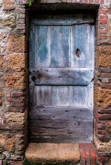 TUSCANY-MAY 30:an old wooden door in Pienza,Tuscany,on May 30,2018.