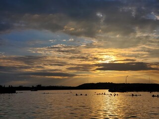 gold sunset over the mariel harbor in cuba 