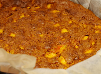 surface of a freshly baked homemade apple and carrot cake 
