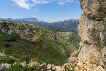 Fototapeta na wymiar beautiful green mediterranean mountain landscape and limestone rocks in Spain tranquility and relaxation