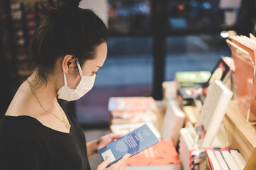 Series photo of young women choosing book in a bookshop , learning and education concept