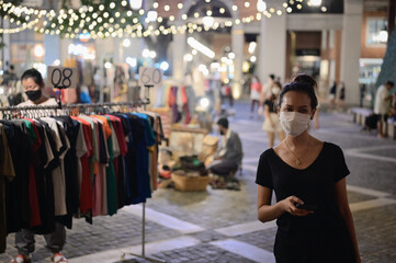 Series photo of young women shopping in night street market , Chaing mai north of thailand