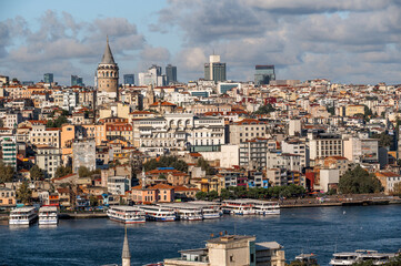 ISTANBUL, TURKEY - OCTOBER 12 ,2021: View to Galata district and Galata Tower. Galata tower....