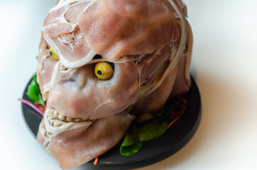 Creatively prepared food in the shape of a scary skull, a fun and interesting food serving for a halloween party