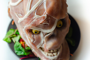 Creatively prepared food in the shape of a scary skull, a fun and interesting food serving for a halloween party