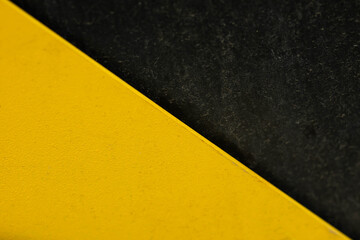 Black and yellow line on non-slip texture, Black and yellow background
