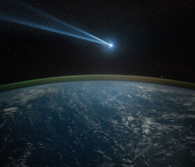 Comet, asteroid, meteorite flying to the planet Earth.  Glowing asteroid and tail of a falling...