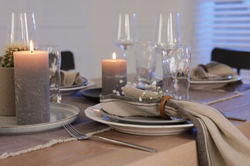 Festive table setting with beautiful tableware and decor indoors