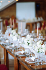 Festive table. Banquet table with wedding and festive serving. Wedding, birthday, party, event concept.