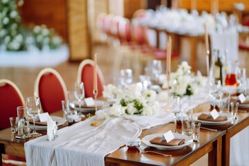 Festive table. Banquet table with wedding and festive serving. Wedding, birthday, party, event concept.