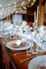 Festive table. Banquet table with wedding and festive serving. Wedding, birthday, party, event concept.