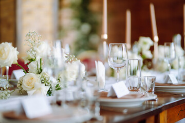 Festive table. Banquet table with wedding and festive serving. Wedding, birthday, party, event concept.