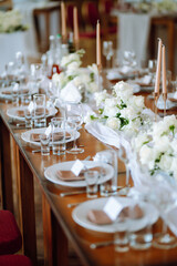 Festive table. Banquet table with wedding and festive serving. Wedding, birthday, party, event concept.