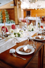 Festive table. Banquet table with wedding and festive serving. Wedding, birthday, party, event concept.