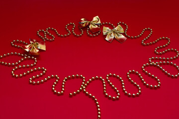 Red Christmas 2022 background New Year golden decoration for Christmas tree with place for text