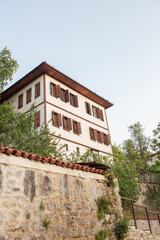 Fototapeta na wymiar Traditional Ottoman house in Safranbolu. Safranbolu UNESCO World Heritage Site. Old wooden mansion turkish architecture. Ottoman architecture