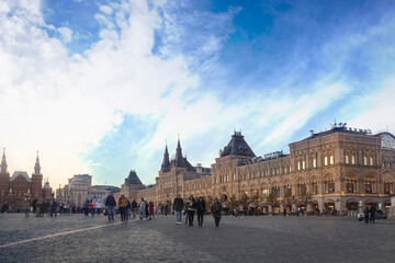 View of GUM with lights on at dusk