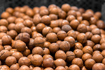 texture of walnut or macadamia nuts with shell