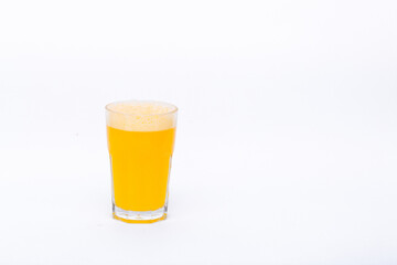 A glass of vitamin orange juice cool on a white background