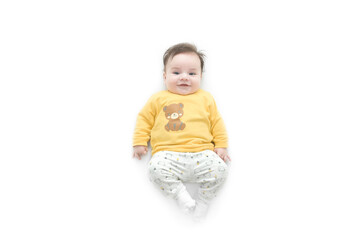 top view of beautiful baby boy three months  old isolated on a white background 