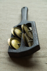Black wooden rhythm clapper (rumba, pandeiro) - noisy wooden percussion folk musical instrument...