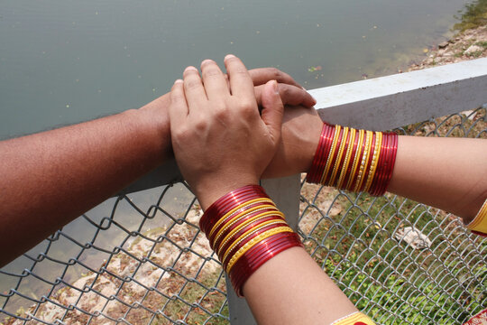 Point-of-view (POV) of a man holding a woman's hand