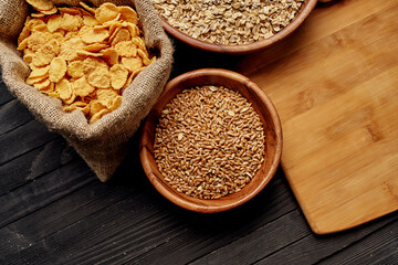wooden tableware cereals products view from above
