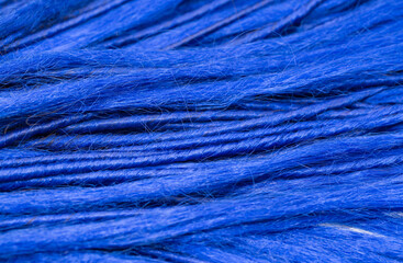 Dreadlocks close-up. Braided by a master hairdresser in the salon, hair braided in dreadlocks. African braids on a white background.