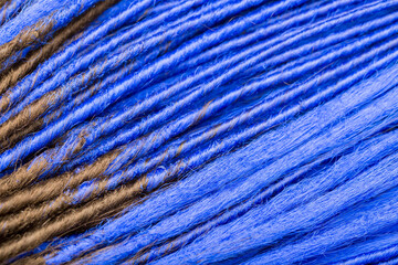 Dreadlocks close-up. Braided by a master hairdresser in the salon, hair braided in dreadlocks. African braids on a white background.