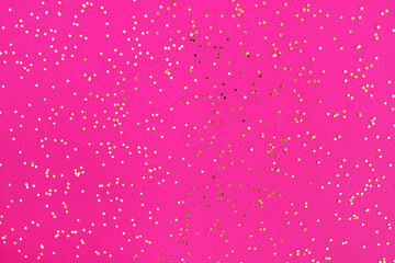 golden sparkling stars sequins glitter on bright pink backdrop seamless banner background