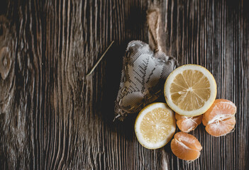 Lots ripe citrus on wooden background