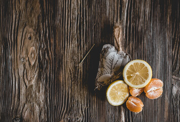Lots ripe citrus on wooden background
