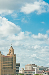 Obraz premium front view of commercial buildings on tropical island in south Atlantic Ocean,on sunny day