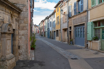 Fototapeta na wymiar Cluny in France, colorful houses, small street in Burgundy 