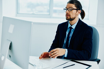 office worker with glasses self-confidence work computer