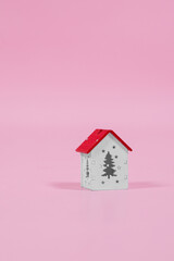 installation with winter background with a house wrapped in warm scarf