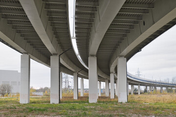 Automobile overpass on concrete supports. Modern road infrastructure.