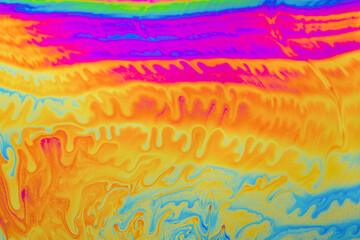 Psychedelic multicolored background abstract. Rainbow colors. patterns background. Photo macro shot of soap bubbles
