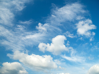 white clouds on blue sky background.