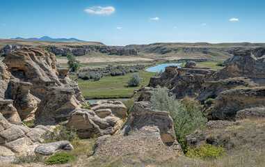 Rock formations on the edge of the Milk River in Writing on Stone Provincial Park in Alberta, Canada