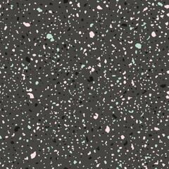 Seamless repeating Terrazzo vector pattern with pink, green, and black chunks on dark grey background. Can be used for wallpaper, home decor, wrapping paper, fashion fabric prints and stationary.
