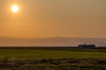 Fototapeta premium Sunset at Icelandic farm